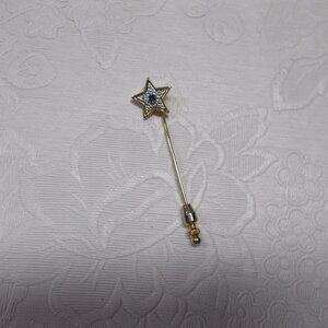 Vintage AVON Starshine five point stick/lapel pin with blue center stone